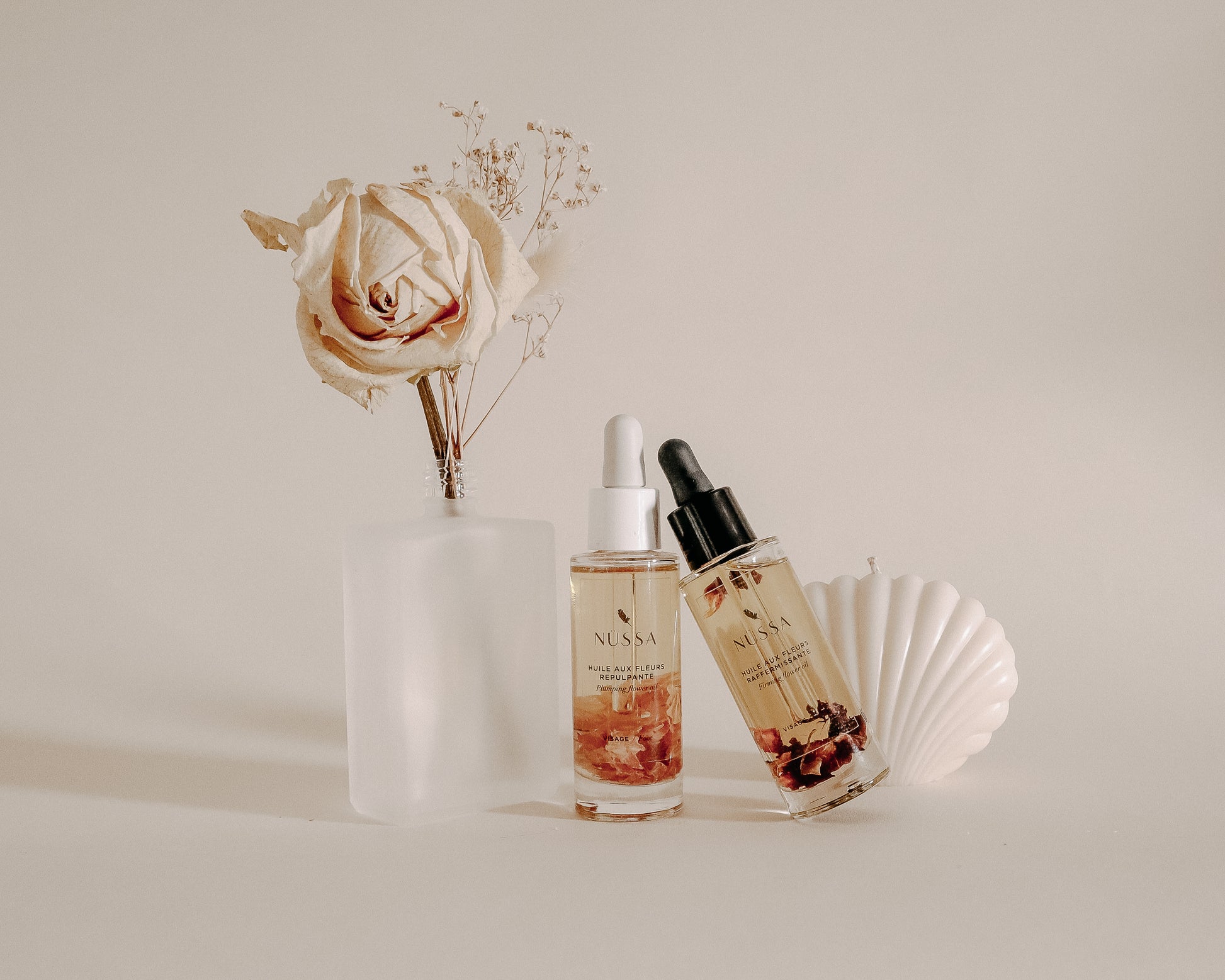 Photo huile fleurs repulpante Nüssa cosmetics